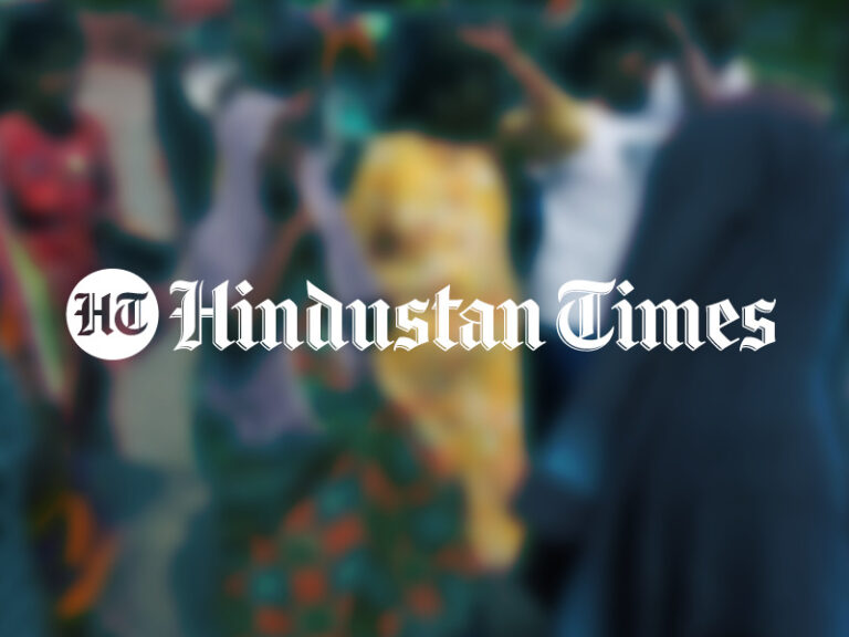 Hindustan Times Logo over a blurred photo of women in India suffering from heat stroke